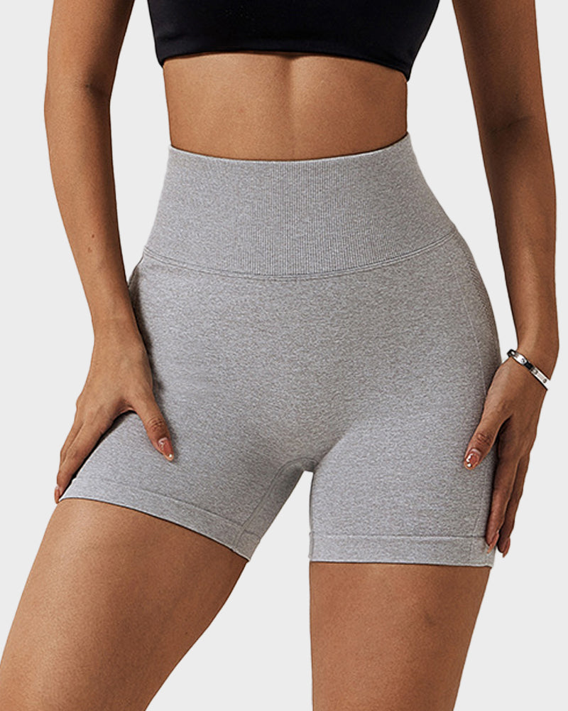 Pantalones cortos de fitness transpirables y sin costuras que realzan los glúteos