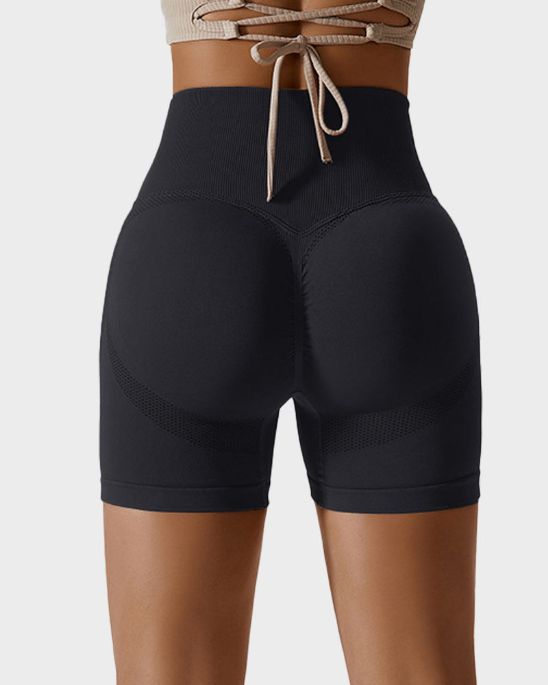 Pantalones cortos de fitness transpirables y sin costuras que realzan los glúteos