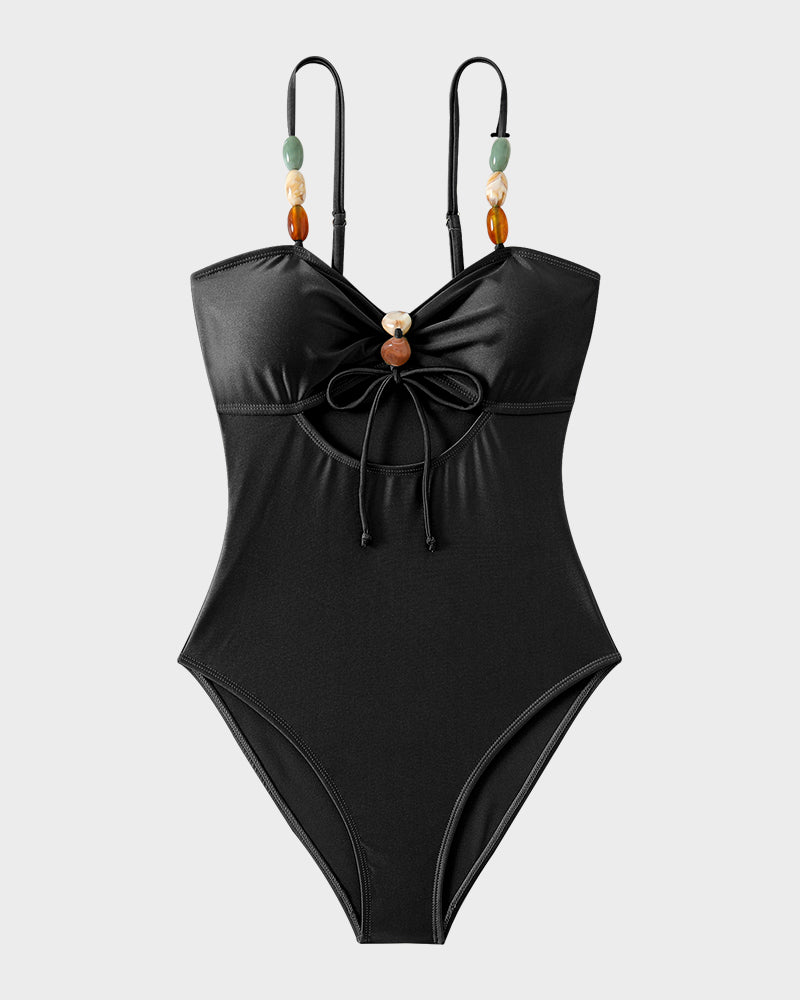 Maillot de bain élégant en satin perlé et découpé