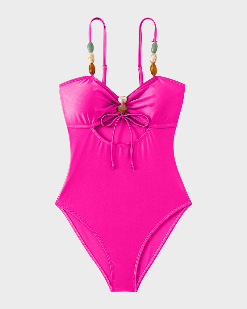 Maillot de bain élégant en satin perlé et découpé