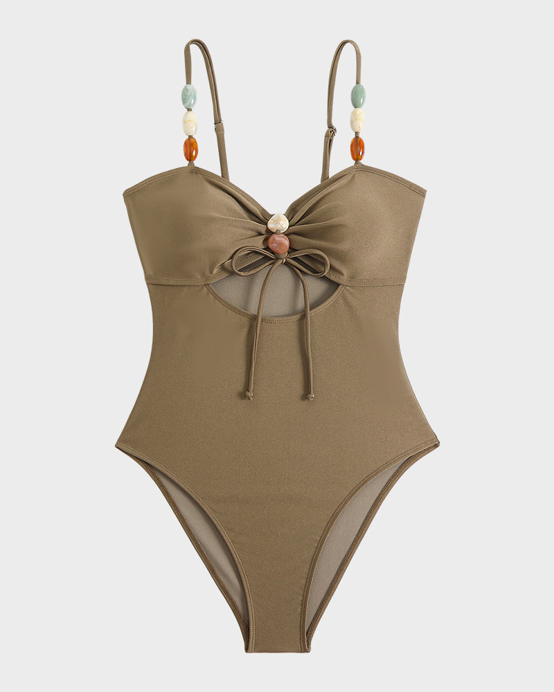 Maillot de bain élégant en satin perlé et découpé